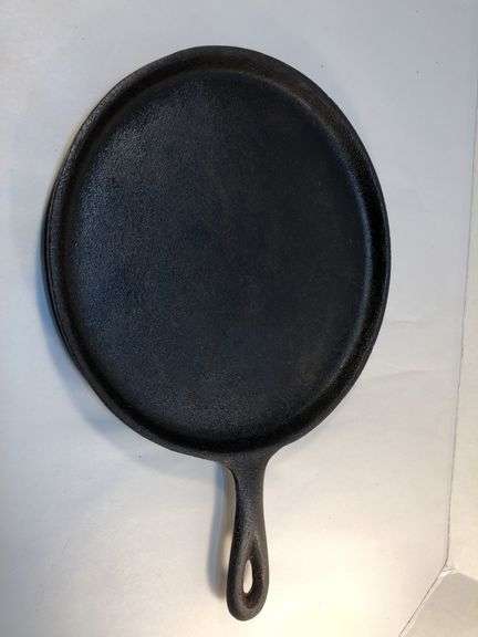 Lodge 9” old style griddle. USA  H 70G. Newly seasoned.