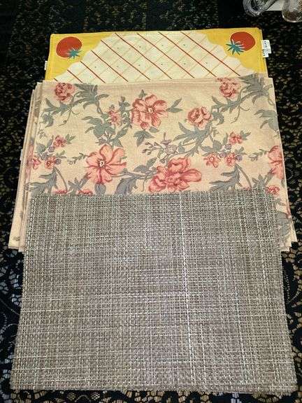 (3) sets of great looking placemats…..too 2 are linen from Pottery Barn and bottom set is nylon…..top yellow has 7, middle floral has 8 and nylon has 6 image
