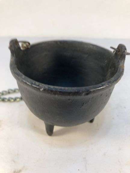 Vintage tiny 3 legged kettle/cauldron with chain for hanging.. 2 5/8” h x 3” w. image