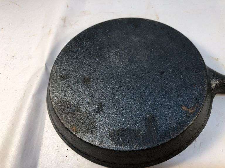 Mini 5” cast iron cookie skillet. 3.75” handle. No markings. No spin, no wobble.