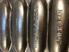 Rare Griswold No. 2700 wheat/corn design cornbread stick pan. #632. Erie, PA.  USA.  13 x 6”. Valued at $475 to 600.