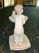 LLADRO “Clean Up Time" bisque porcelain figurine (#4838)……7-1/2” tall