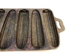 Antique BSR 7 stick cornbread pan. 12.75” x  5.5”.  7 S