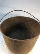 Antique gate marked 3 leg bean pot. 9” diameter. 7 1/4” H.