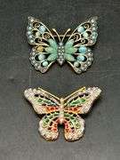 (2) beautifully designed butterfly brooches