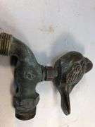Decorative brass bird and water spigot. Bird 3.5 x 2.5” overall height 5”.