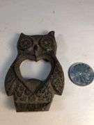 Adorable cast iron owl bottle opener. Heart shape in center. 3 1/4 x 2 1/8”