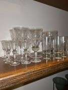 Shelf of crystal glassware……there is chipping on several…..please see all pics as I could not get one long shot of all