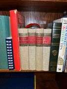 3 shelves of books of various titles and by variety of authors…..both paperback and hardback