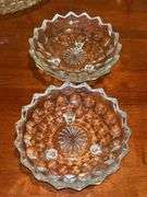 Grouping of (4) Fostoria American Cubist pieces…..(2) 6-1/4”D footed bowls, (1) 7-3/4” footed plate and (2) 10” divided serving piece (has 3 tiny chips around rim)￼