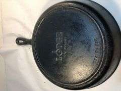 Lodge 10 1/2” 2 spout skillet with heat ring. No spin, no wobble.