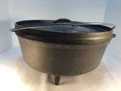 Lodge #12 12” 6 quart outdoor Dutch oven with flanged lid and integral legs. Stored in original box. Possibly new.