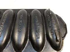 Rare Griswold No. 2700 wheat/corn design cornbread stick pan. #632. Erie, PA.  USA.  13 x 6”. Valued at $475 to 600.