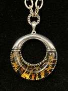 Link chain necklace with round silver tone and acrylic leopard print design pendant