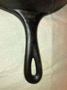 Griswold No. 8 cast iron skillet, identifiable by the "8-B" and "MADE IN USA". MM: D2