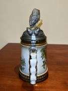 (2) very nice owl home decor items…..left is a pitcher by Fitz & Floyd and stands 8-3/4” tall (1 tiny chip on back log)…..right is an Opa’s Haus Inc. Edition owl themed stein  from The American Wildlife Stein Series (9” tall)