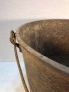 Antique gate marked 19th-century Louisiana cast iron sugar kettle. These large, spherical cast iron kettles were primarily used in the production of sugar on plantations in the American South, especially in Louisiana where sugarcane cultivation thrivedMarked 8 MG. 10” diameter. 8” H.