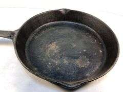 Vintage cast iron skillet with lid. 2 spout. 10” diameter. No spin, no wobble. No markings except an A in the lid.