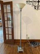 Gold tone floor lamp with glare glass shade…..70” tall