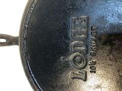 Lodge 10 1/2” 2 spout skillet with heat ring. No spin, no wobble.