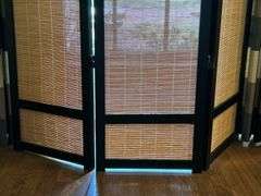 Wooden tri-fold screen with faux bamboo fillers on each panel……each panel measures 16” and is 71” tall