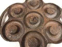 Rare unknown cast iron donut pan. Marked Pat. Pending. 7 donut slots. 10x 9.5”   Makes 3” diameter donuts