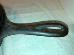 #5 3 notch Lodge skillet with 2 spouts and heat ring.  8” diameter.