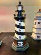 Nice selection of lighthouses made from various materials…..far left is musical (needs batteries, far right is a bank…..heights range from approx. 12-1/2 to 13-1/2” tall