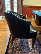 Barrel back leather office chair on casters…..sows wear from normal use but lots of life left…..sits and rolls very well….25 x 18 x 29-3/4 tall overall