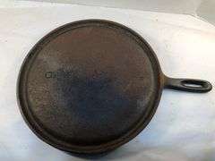 Wagner Ware cast iron griddle, specifically a No. 9 Sidney Arc Logo  Griddle. H G. 10.5” diameter. HS marked. No spin, no wobble.