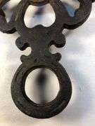 Vintage Wilton cast iron trivet. 8 x 4”.