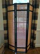 Wooden tri-fold screen with faux bamboo fillers on each panel……each panel measures 16” and is 71” tall