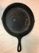 Griswold No. 8 cast iron skillet, identifiable by the "8-B" and "MADE IN USA". MM: D2