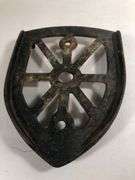 Antique cast iron trivet, specifically designed as a rest for a "sad iron" or "flat iron". 6 x 4.5”