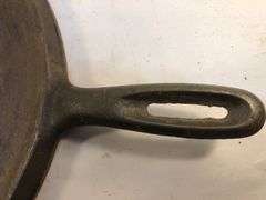 Wagner Ware cast iron griddle, specifically a No. 9 Sidney Arc Logo  Griddle. H G. 10.5” diameter. HS marked. No spin, no wobble.