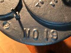 Antique cast iron #19 Buckeye Incubator Co. cast iron coal stove. 22” H x 11.5” W.