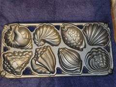 John Wright cast iron seashell gem pan. New never used