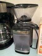 Selection of Amazon Basics coffee maker, Cuisinart Coffee Grinder and Cuisinart hinged oval bread pan