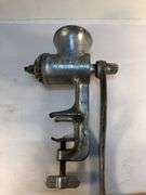 Antique Ward’s silver metal meat grinder. Wooden handle hand crank. Clamp for attaching to  surface for grinding meat. In excellent condition