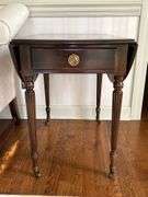 Statton TruType Americana single drawer drop leaf side table with brass casters…..does have spotting on top…..sides down 19 x 27-1/2 x 26-1/2 tall….side up 35-3/4w