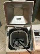 Grouping of small kitchen appliances, electric griddle, fondue set, breadmaker and more