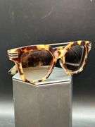 Pair of REPRODUCTION GUCCI leopard print sunglasses…..lens have slight scratching