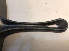Internationals black cast iron 9” square ribbed griddle pan with pour spout. 1 1/4” D. No spin, no wobble.