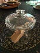 Clear glass candy/apothecary jar with lid and wooden scoop….6-5/8” D x 10” tall