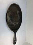 Oval fajita skillet/sizzler 15” L.  9.5 x 7” cooking surface. 0 on underside of handle is the only marking.