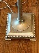 Gold tone floor lamp with glare glass shade…..70” tall