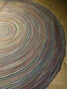 13-1/2’ x 9-1/4’ oval braided rug in really good condition…..there is a taped spot on back but didn’t find any loose braiding