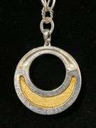 Link chain necklace with round silver tone and acrylic leopard print design pendant