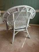 White wicker chair with cushion…..31-3/4 x 23 x 18 to top of cushion (32 tall overall)