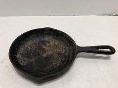 6 1/2” #2  3 notch skillet with heat ring and 2 spouts. Rounded interior surface. Made in Korea.